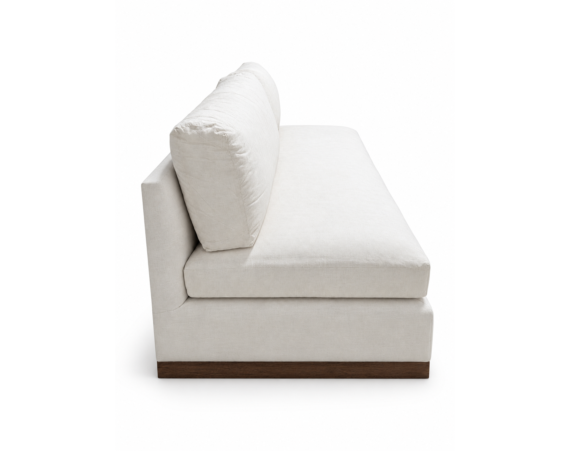 Armless loose seat and loose back settee - side view